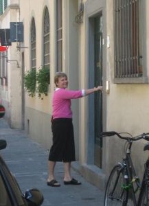 a woman standing outside Panella's Residence Florence