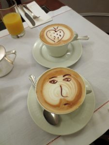two cups of coffee with cute decorations in Tuscany