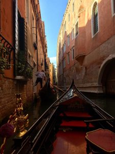 view of Venice from a gondola in Italy