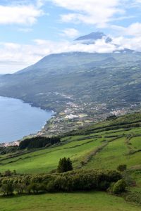 overlook of a small town, sea and mountains on Azores Islands Portugal
