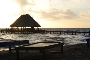 the golden sunset over Belize waters 