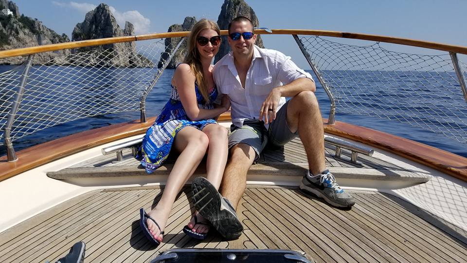 honeymooners on a boat in italy