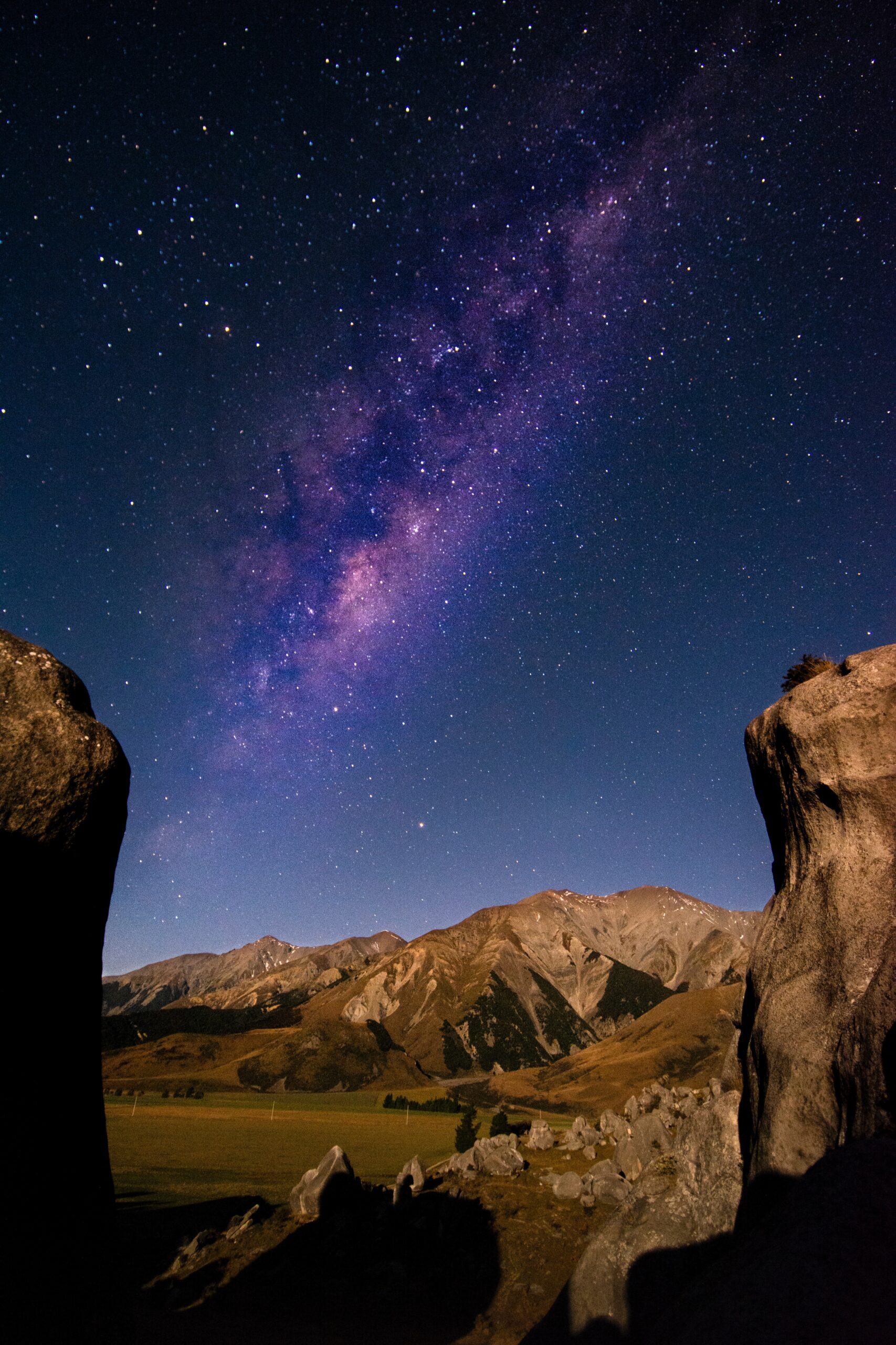 the night sky with purple nebula in New Zealand