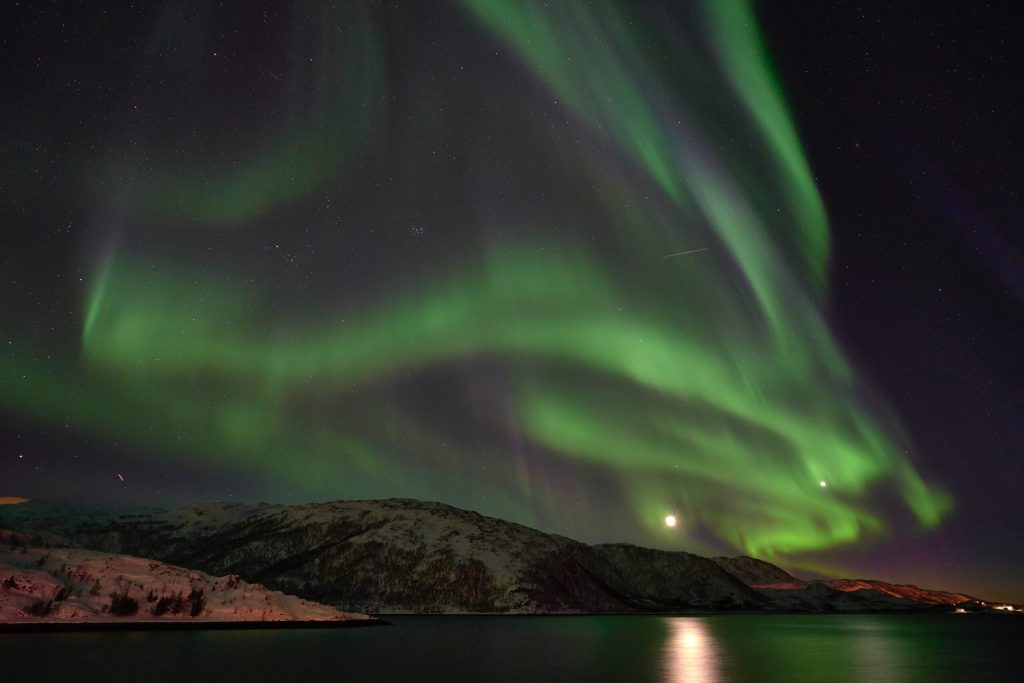 Aurora Northern Lights over water in Norway