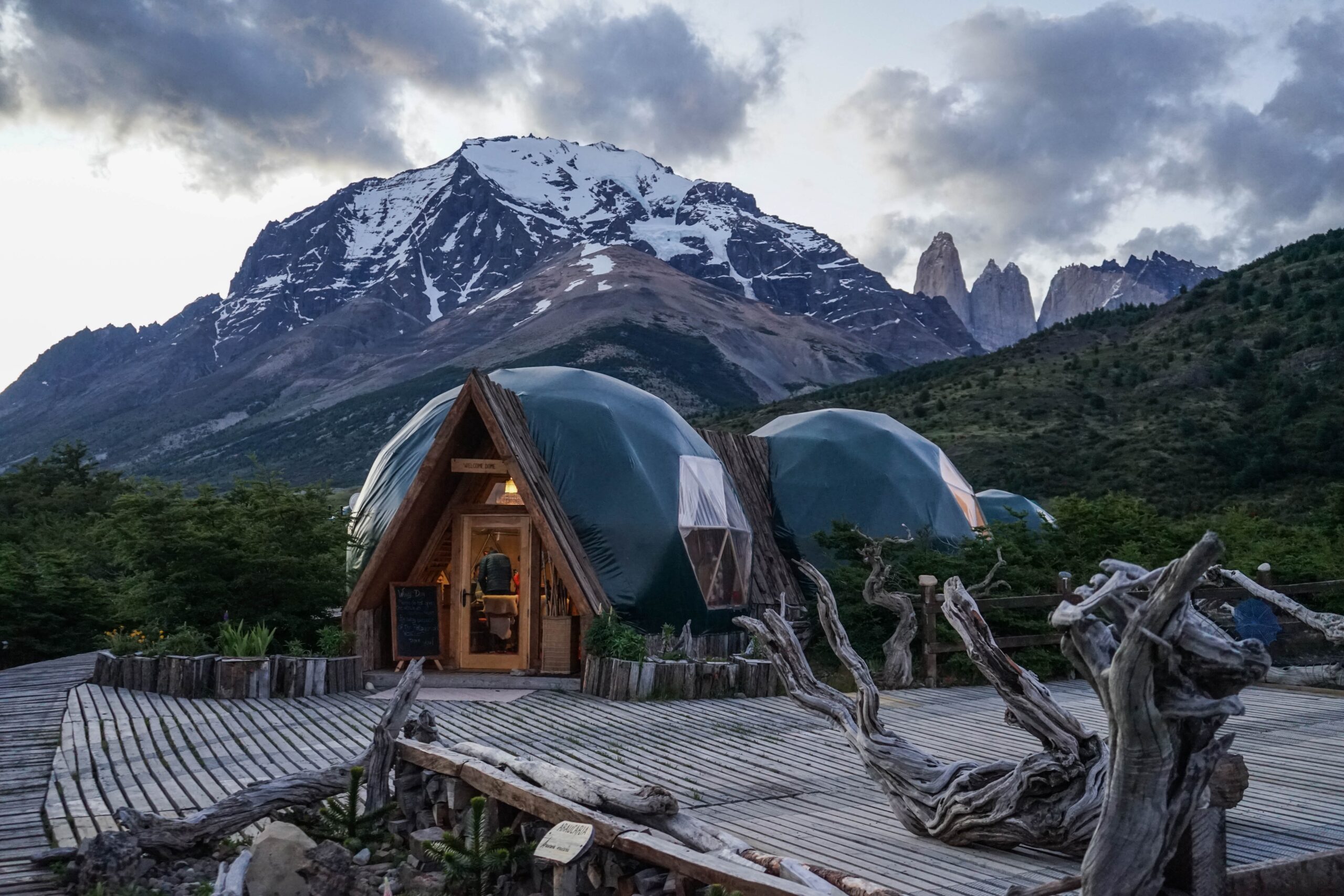 a geodesic cabin with a beautiful mountain view for a glamping or luxury camping adventure