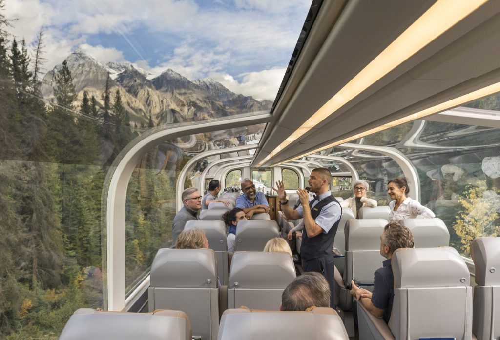 the interior of the Rocky Mountaineer train with domed glass giving passengers a 360 degree view of the Canadian Rockies