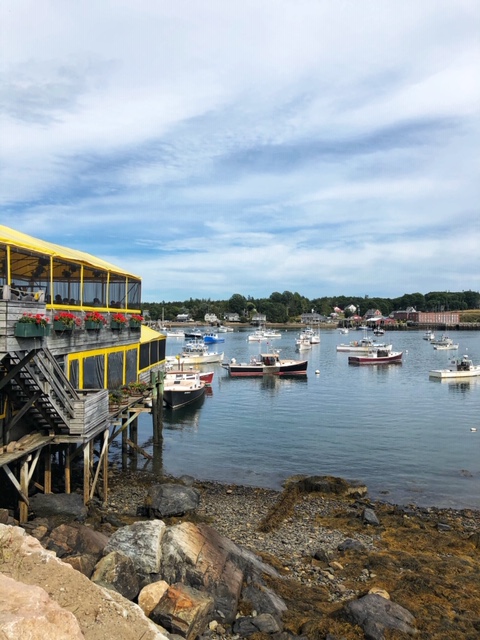 seating over the harbor with the harbor in the background at Thurstons in Bar Harbor Maine