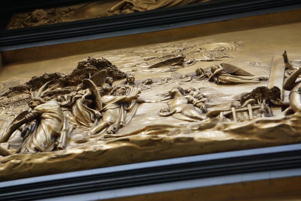 a panel of the Gates of Paradise on the Baptistery in Florence Italy