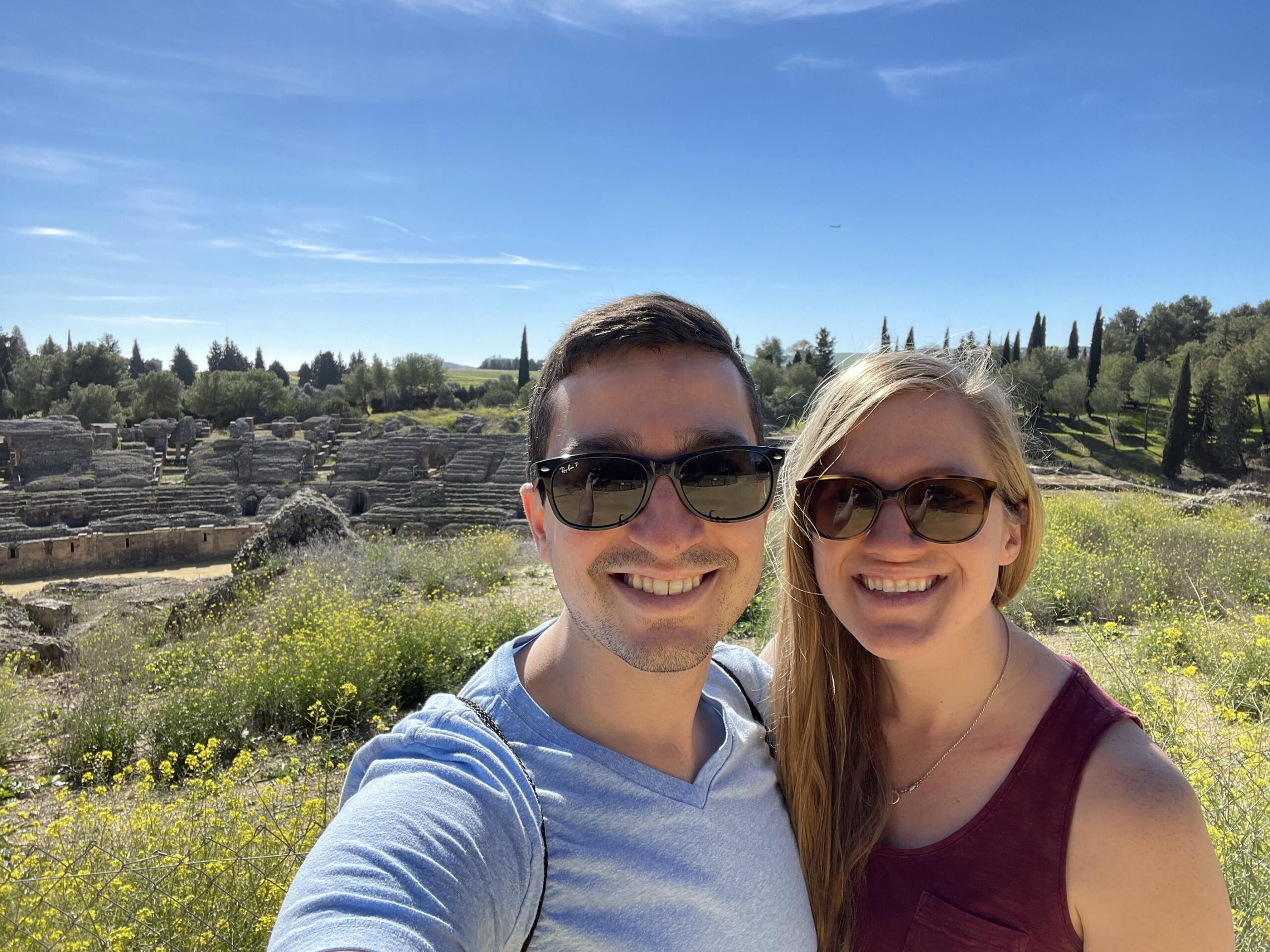 travel couple visiting the Italica ruins in Seville Southern Spain