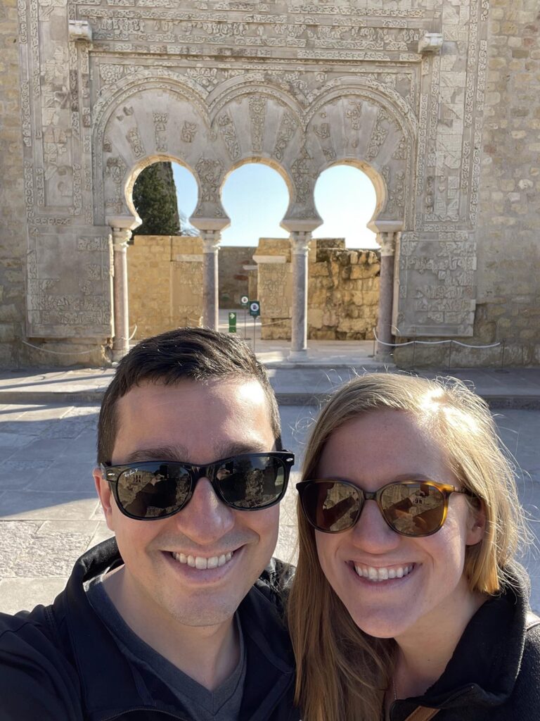 travel couple and the ancient ruins of Medina Azahara in Cordoba